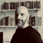 Black and white headshot of Prof Nick Lord