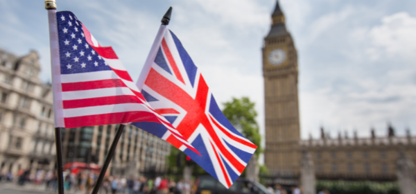 United States flag and United Kingdom flag flying outside UK Parliament