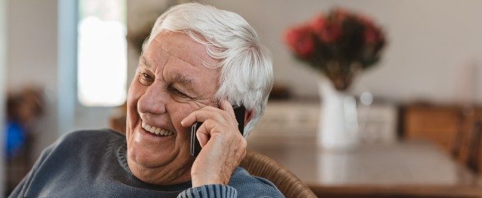 Older man speaking on a mobile phone